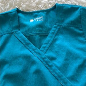 Four stretch Scrub Top EUC